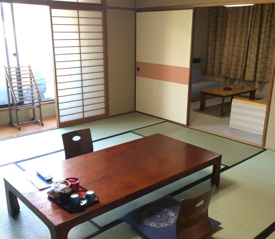 טאקאצ'יהו Imakuni Ryokan חדר תמונה